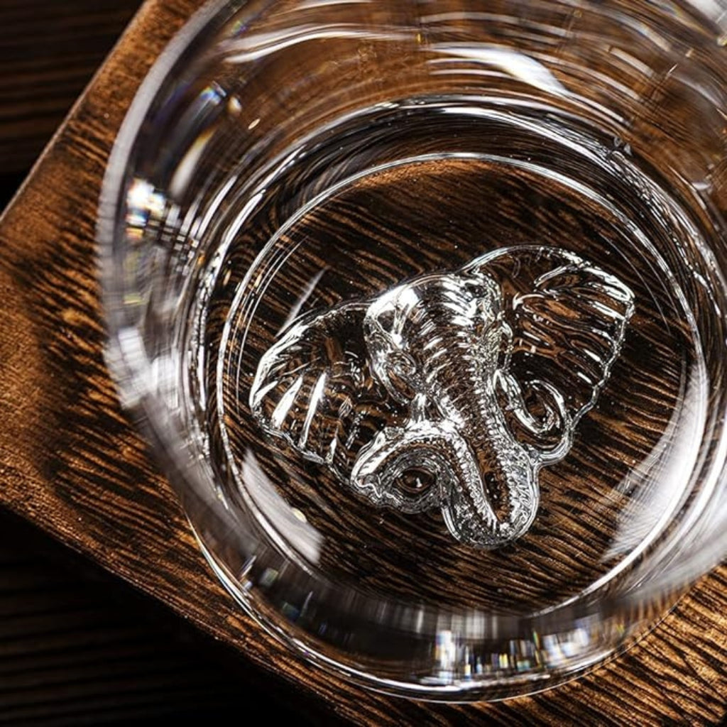 Elephant-themed whiskey glass Elephant-shaped whiskey glass Whiskey glass with elephant design Unique elephant whiskey glass Handcrafted elephant whiskey glass Elephant engraved whiskey glass Elephant motif whiskey glass Elephant lover's whiskey glass Elephant gift whiskey glass Elephant decor whiskey glass