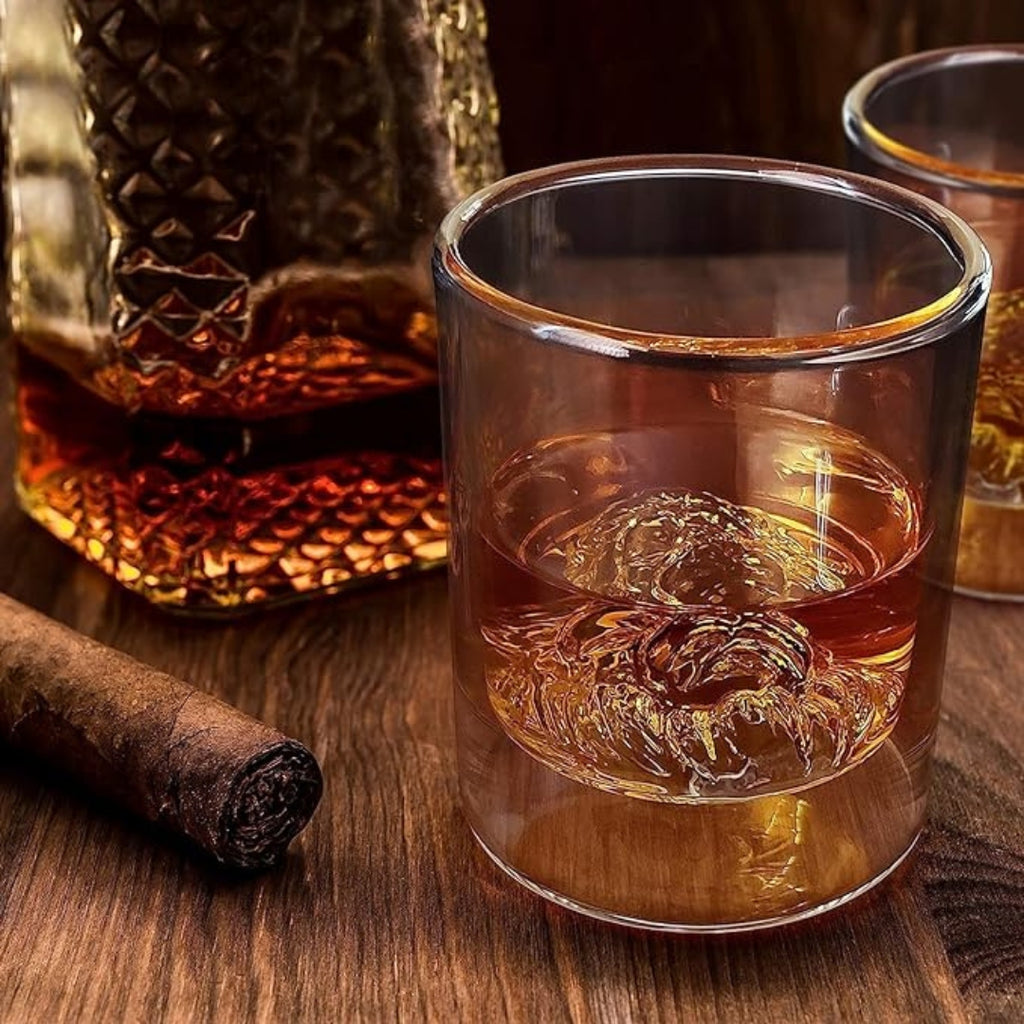 Lion whiskey glass Unique whiskey glass Whiskey tumbler with lion design Collectible lion themed whiskey glass Novelty whiskey glass Lion head whiskey glass Lion engraved whiskey glass Lion motif whiskey tumbler Lion-shaped whiskey glass Lion emblem whiskey glass