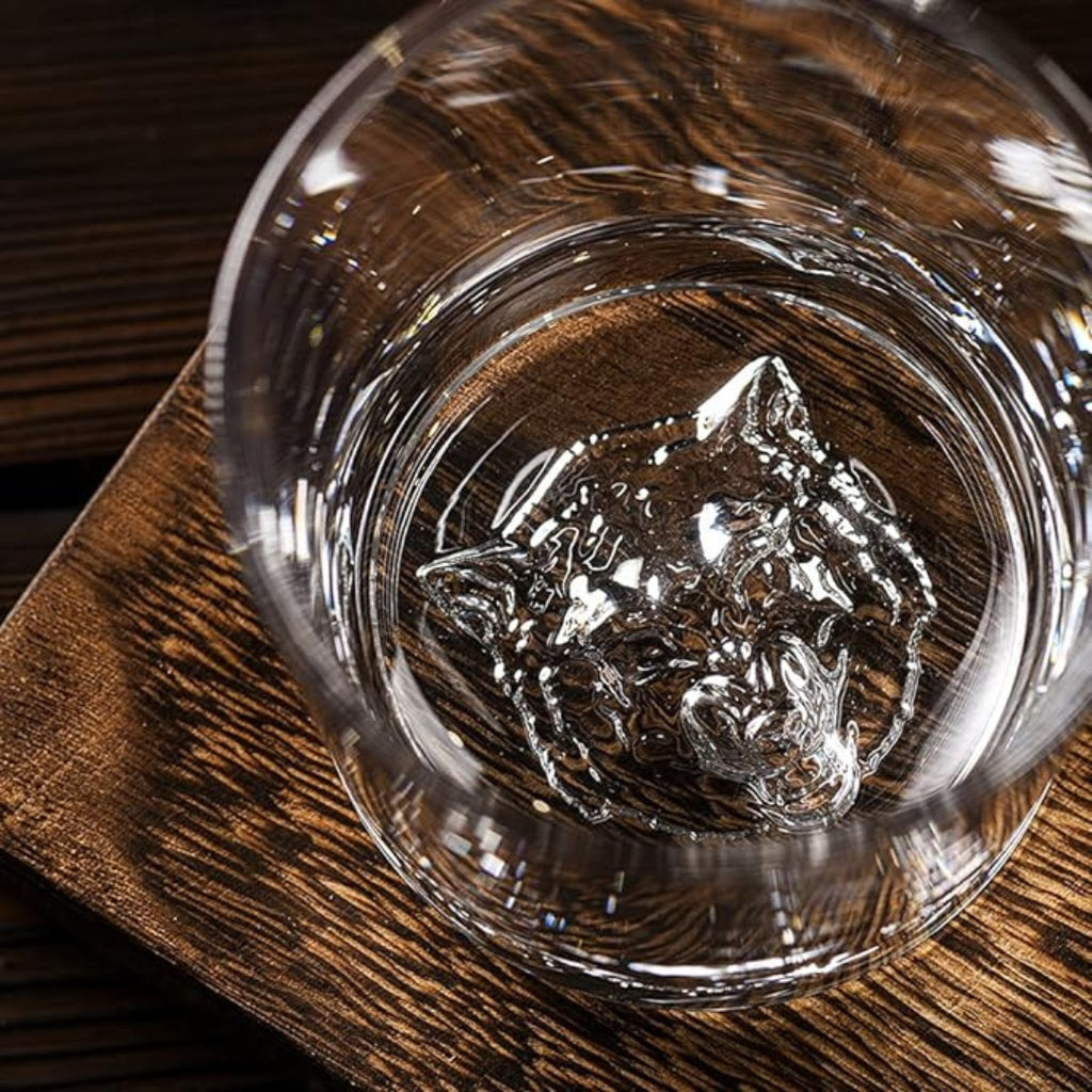 Wolf-themed whiskey glass Unique whiskey glass with wolf design Whiskey glass featuring wolf motif Wolf engraved whiskey glass Wolf head whiskey glass Howling wolf whiskey glass Whiskey glass with wolf silhouette Wolf etched whiskey tumbler Custom wolf whiskey glass Wolf-inspired whiskey drinking glass