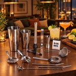 14-piece stainless steel cocktail shaker bar set on a home bar with cocktails